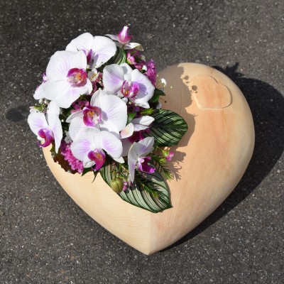 Urnengesteck mit Orchideen